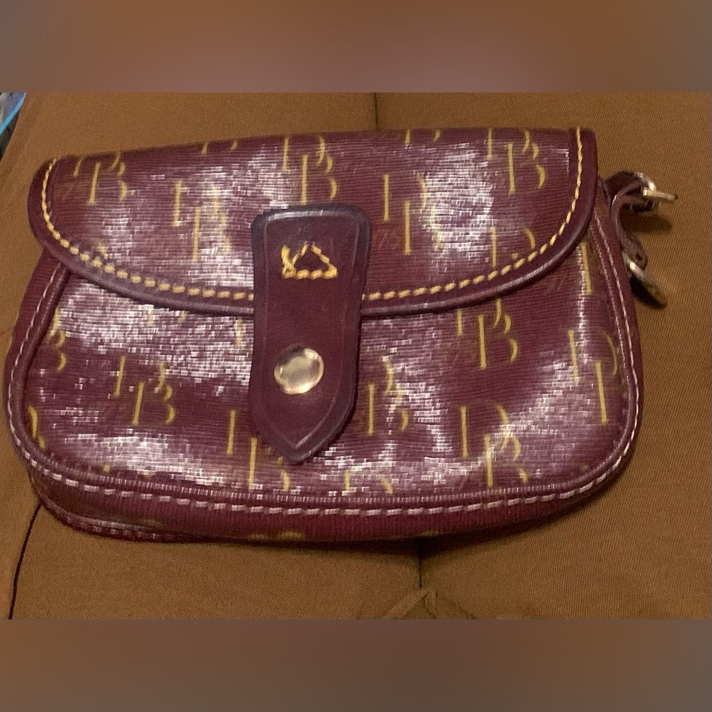 Dooney & Bourke Burgundy Signature
Leather & Canvas Flap Wristlet